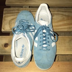 Light Blue Adidas Gazelle shoes.